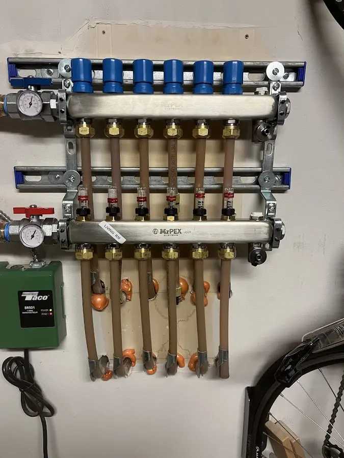 Plumber performing Water Heater Repair at a residential property in Black Diamond